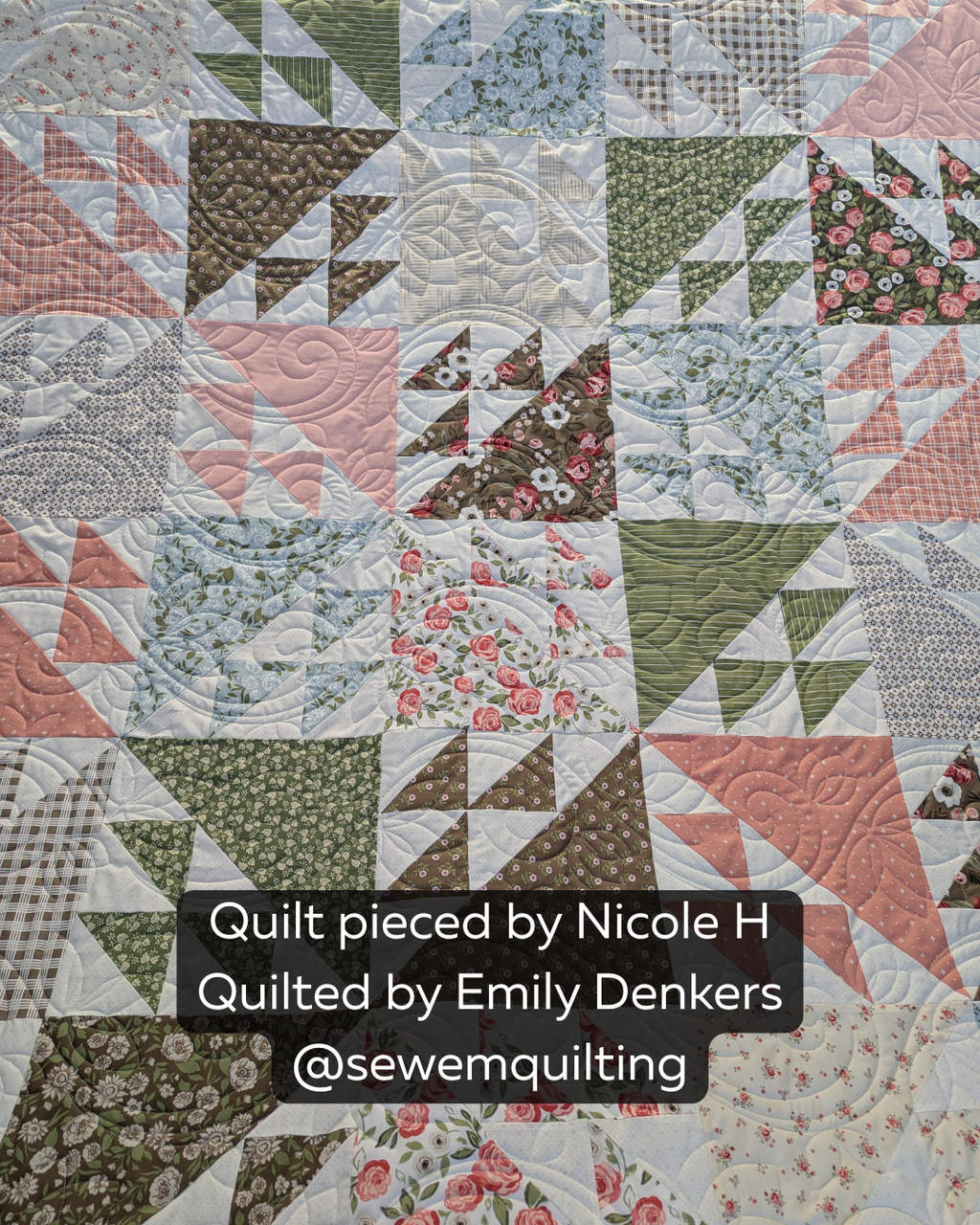 Bella Flower Vine pantograph quilted across a floral patchwork quilt in dusty pink, sage green, soft blue, and cream.
