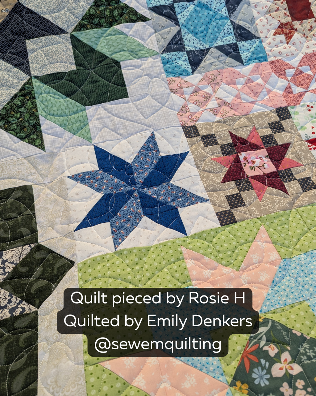 Big Blossom digital floral pantograph stitched across a colorful patchwork quilt featuring large flower motifs and graceful curved quilting lines.