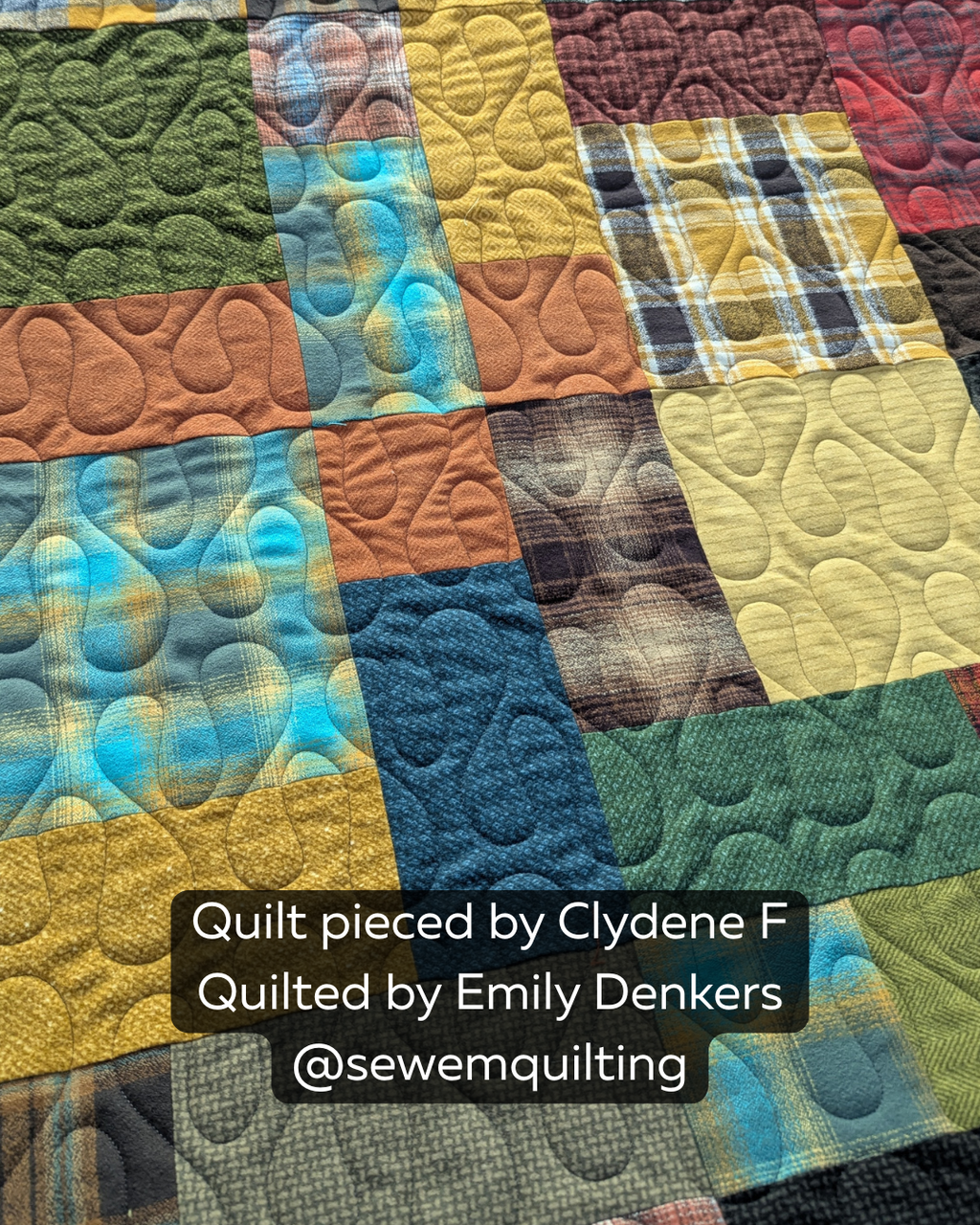 Blob Organic Curve pantograph stitched across a colorful patchwork quilt with flowing organic shapes and smooth curved quilting lines.