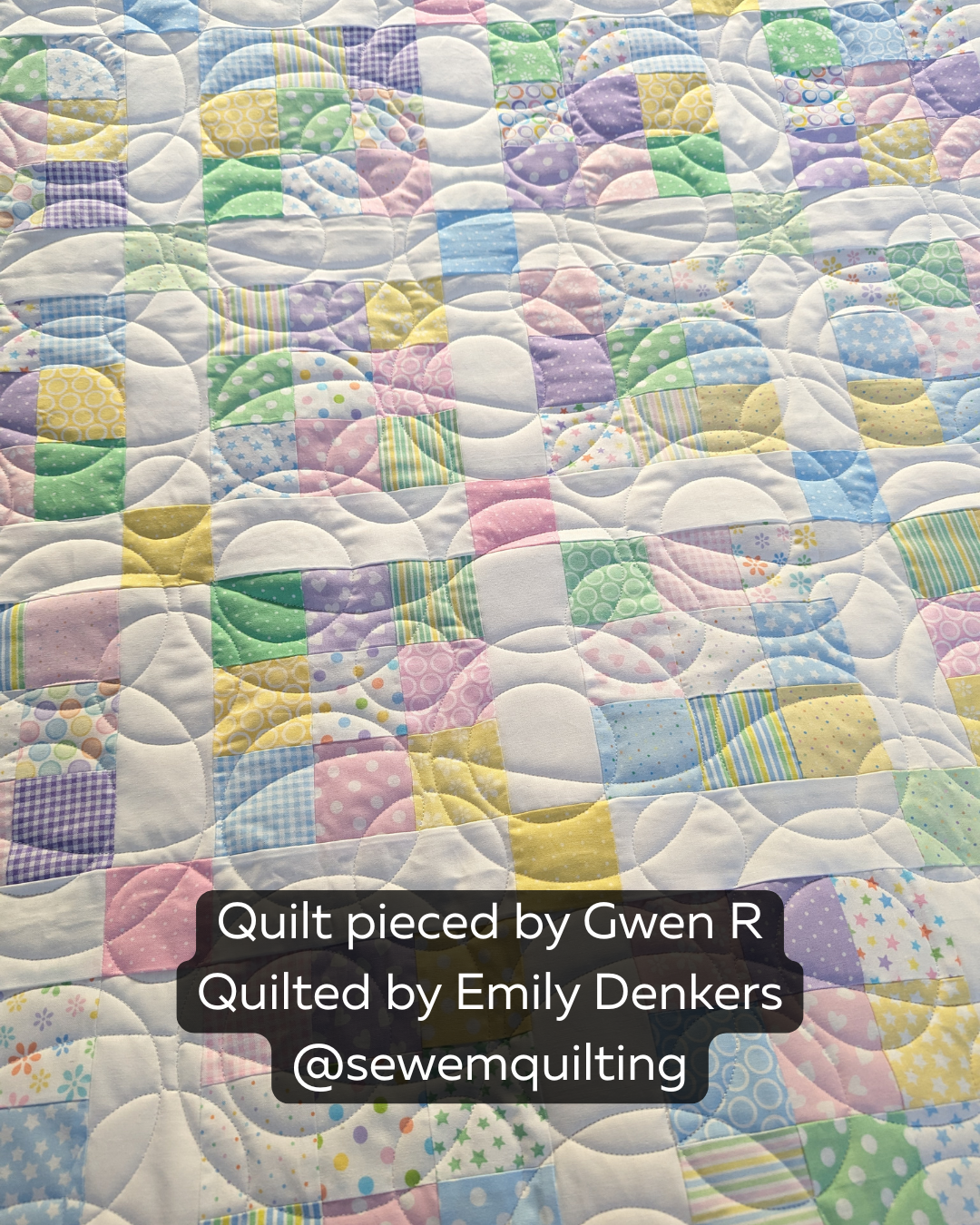 Bubble Quintuple digital bubble pantograph stitched across a pastel patchwork quilt with playful rounded bubbles and flowing edge-to-edge quilting lines.