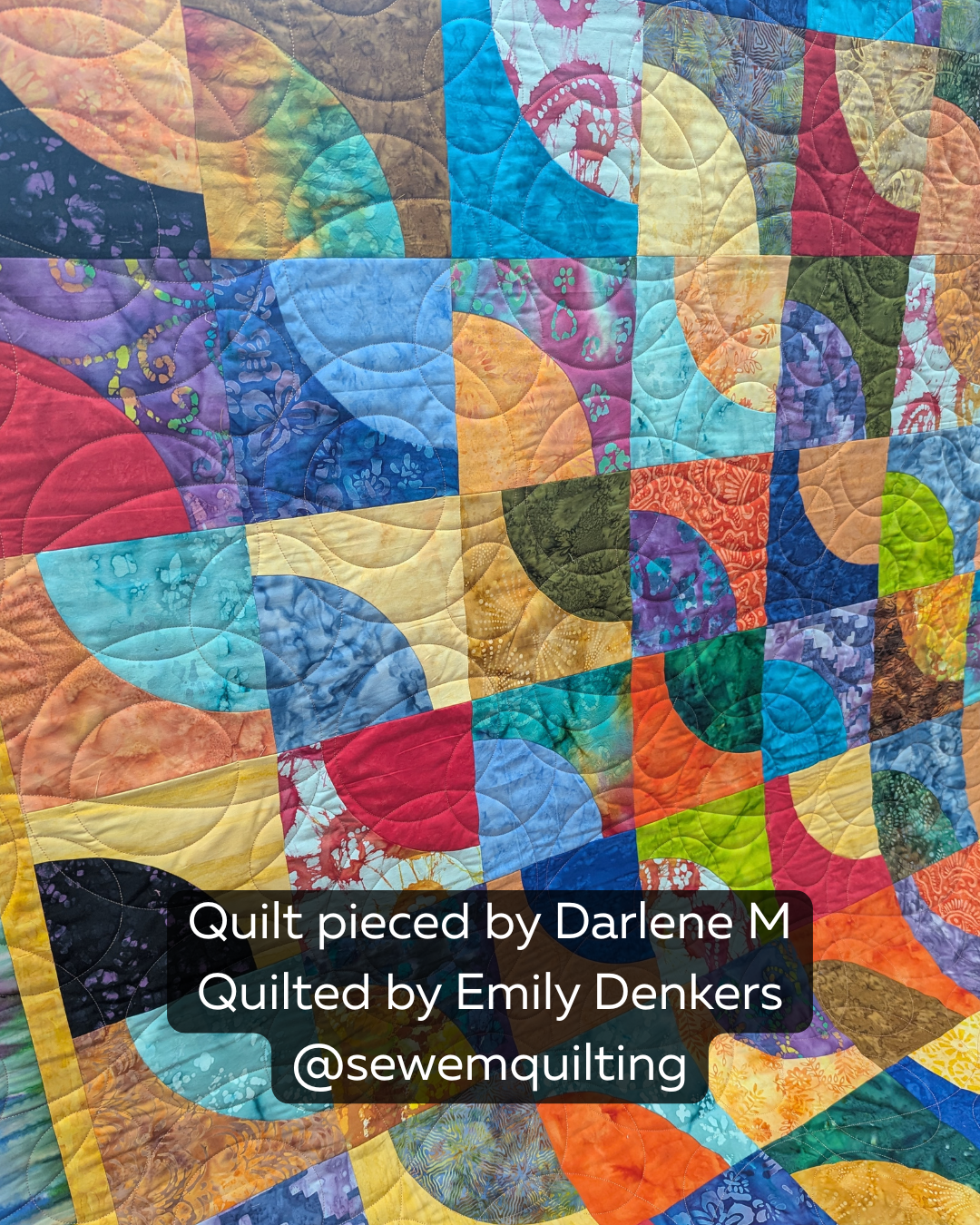Bubble Quintuple digital bubble pantograph stitched across a vibrant multicolor patchwork quilt with flowing rounded bubble motifs and curved quilting lines.