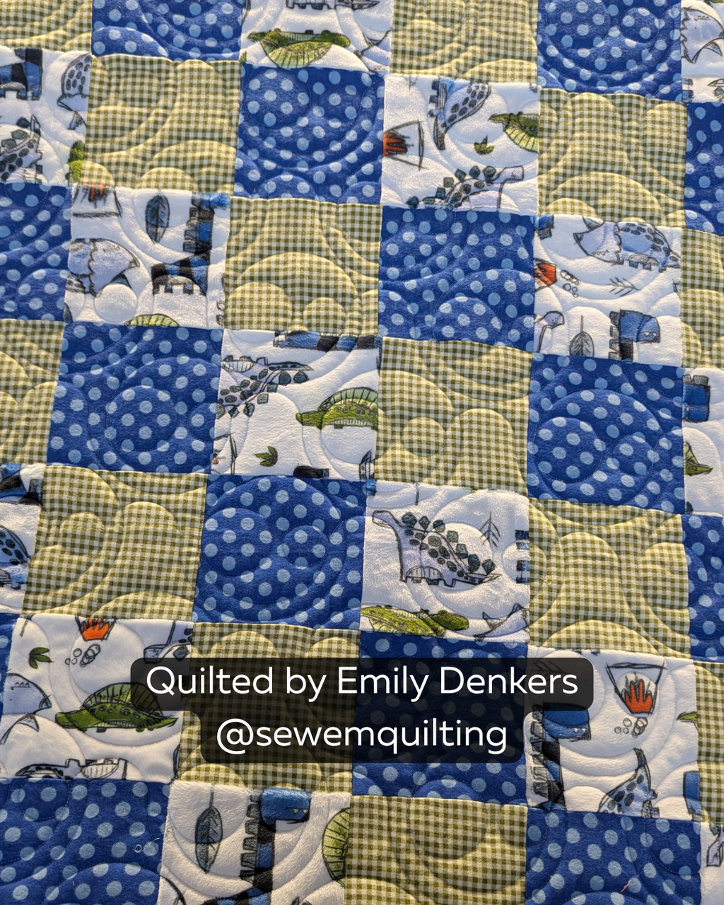 Colorful completed quilt quilted with Derpy Grin, a whimsical longarm quilting pantograph featuring cheerful grins and flowing curved shapes.