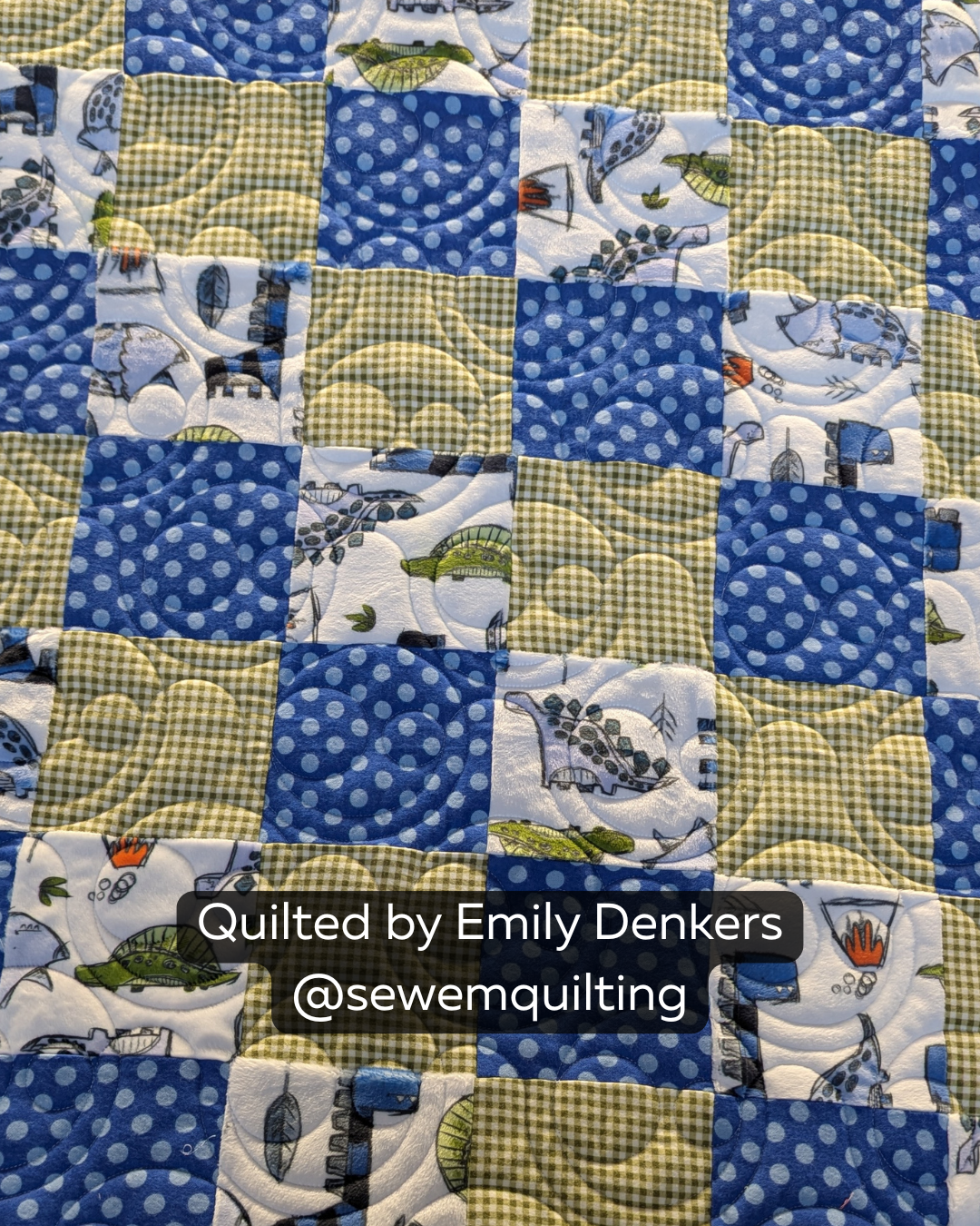 Colorful completed quilt quilted with Derpy Grin, a whimsical longarm quilting pantograph featuring cheerful grins and flowing curved shapes.