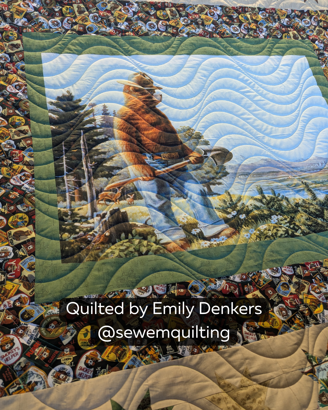 Finished outdoor-themed quilt featuring the Drift Extended Width quilting pantograph, with smooth flowing waves stitched edge to edge across the scenic design.