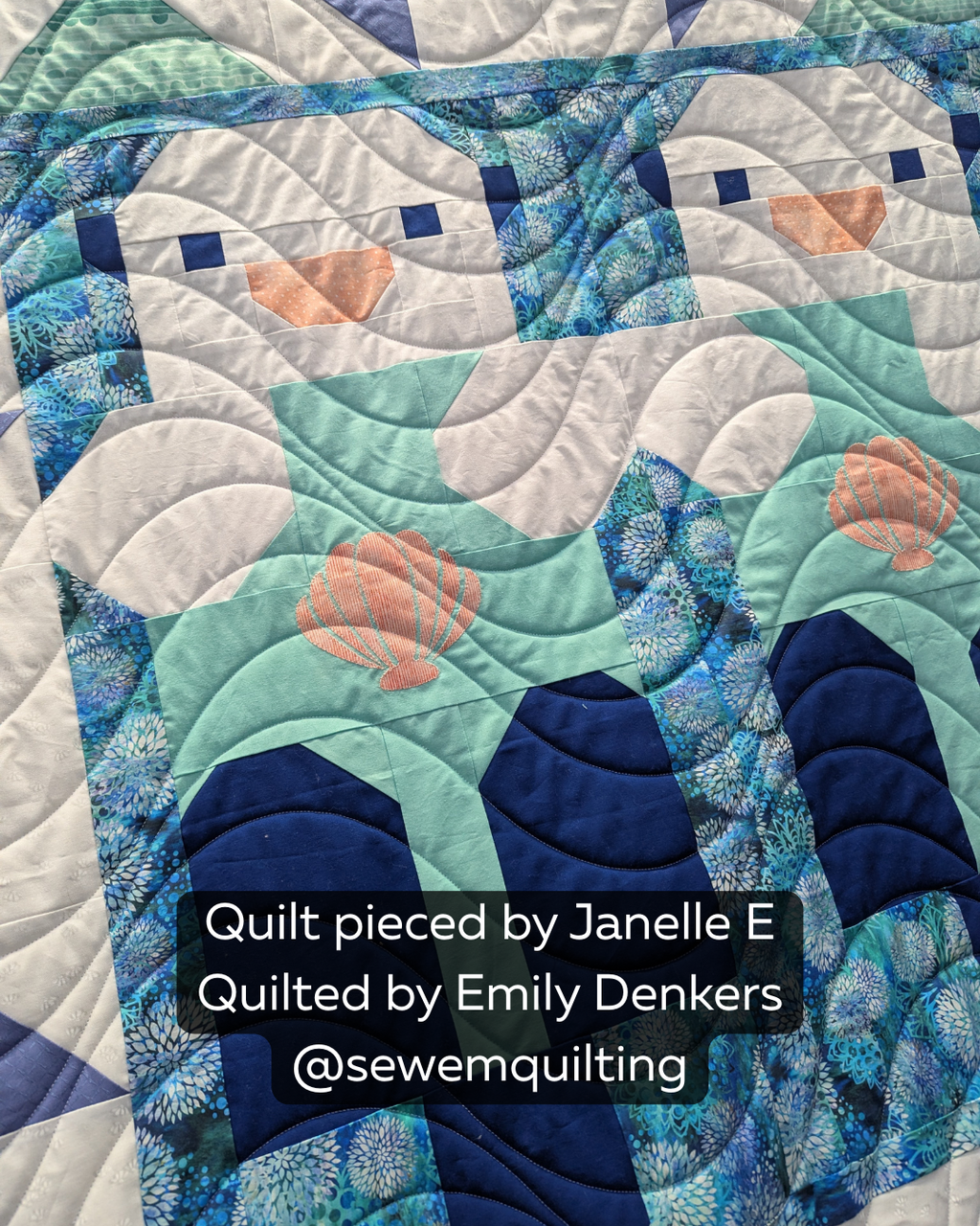 Drift Extended Width modern wave pantograph stitched across a blue and teal quilt with flowing wave motifs and smooth edge-to-edge quilting lines.