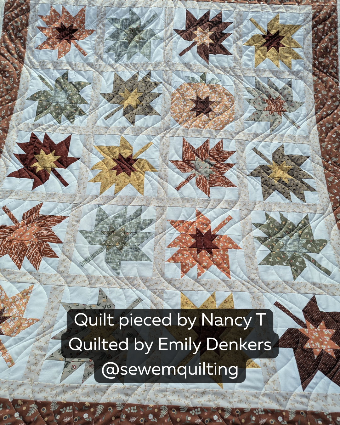 Drift Extended Width modern wave pantograph stitched across an autumn-inspired maple leaf quilt with flowing curved quilting lines and edge-to-edge texture.