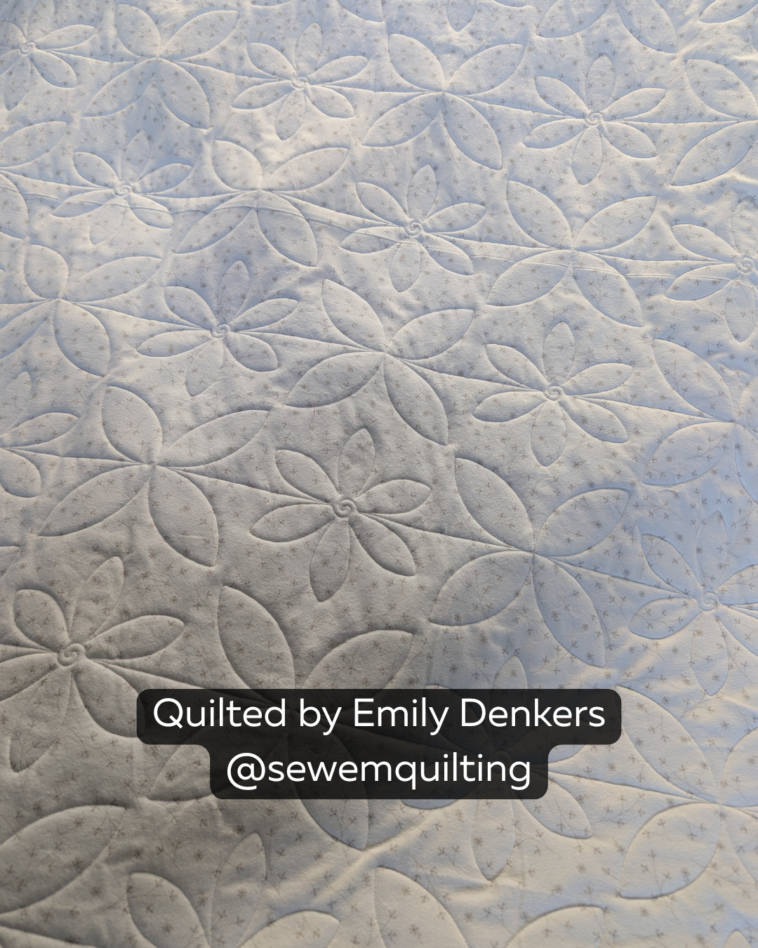 Finished floral quilt featuring the Easy Blooming Orange Peel digital quilting pantograph with elegant petals and flowing botanical texture