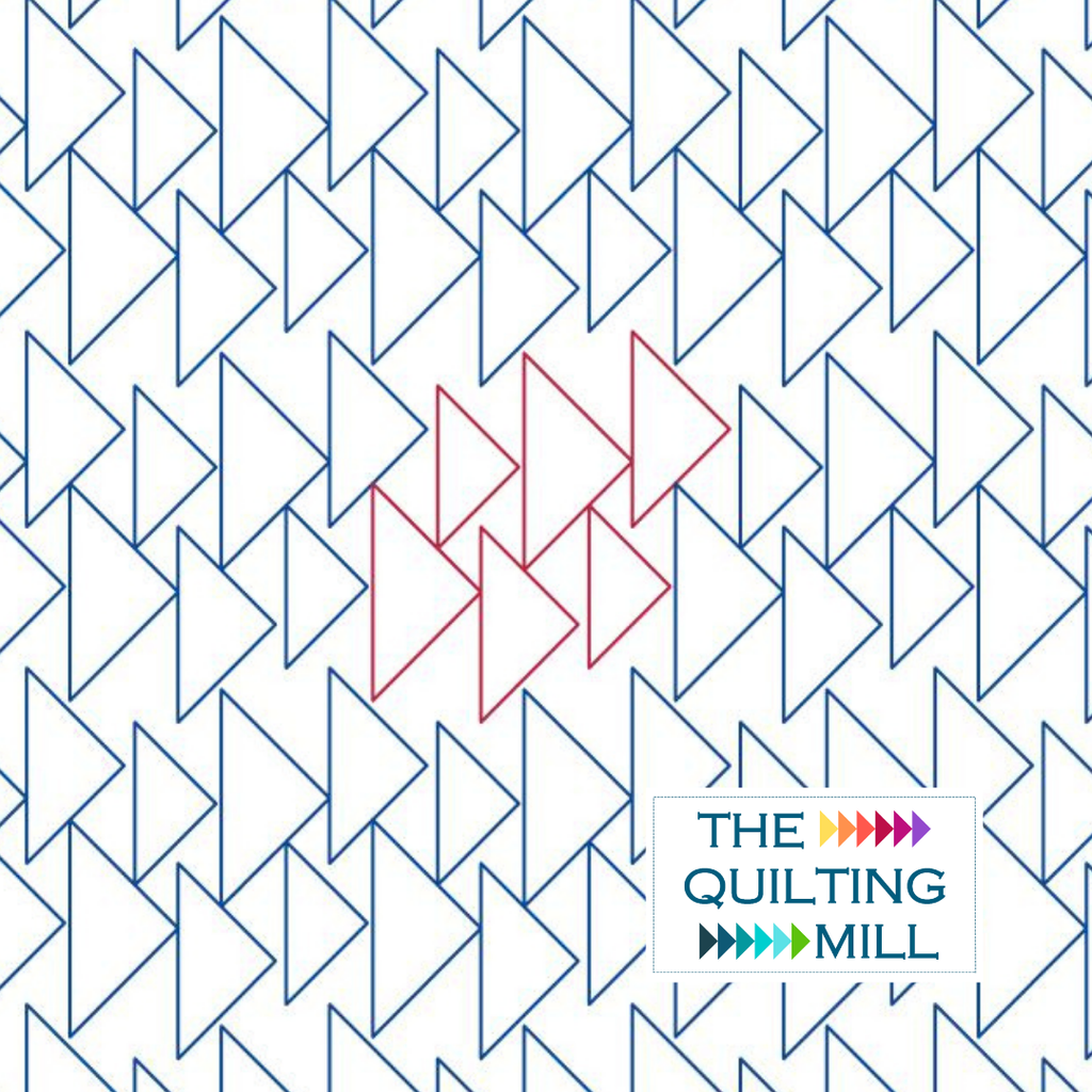 Flankies geometric pantograph design stitched on a modern quilt top, showing how this longarm pantograph creates a bold, architectural triangle texture across the full surface.