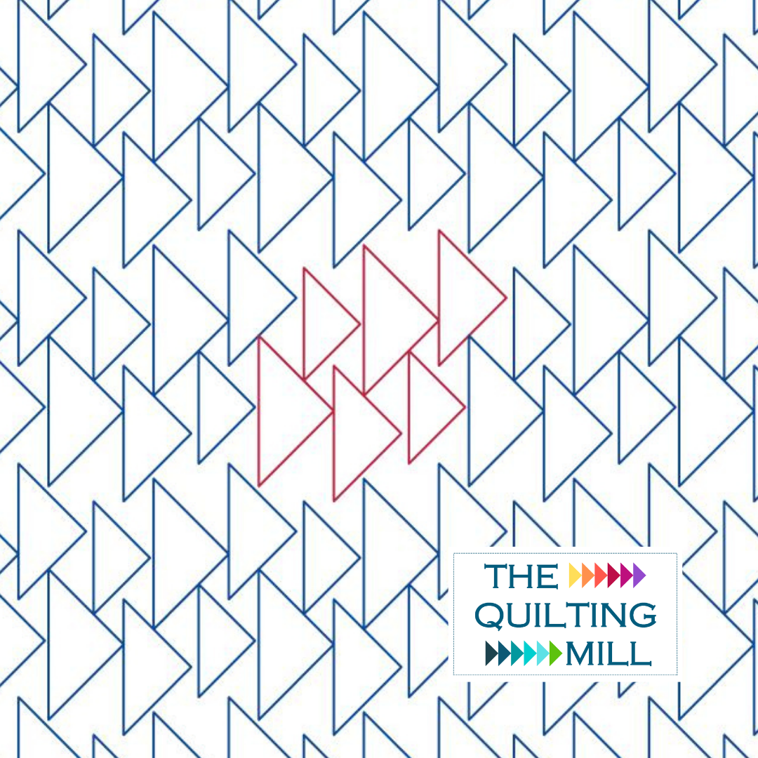 Flankies geometric pantograph design stitched on a modern quilt top, showing how this longarm pantograph creates a bold, architectural triangle texture across the full surface.
