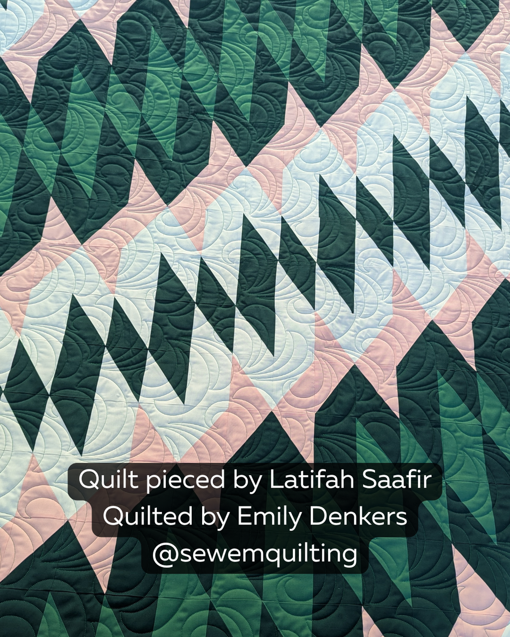 Fwoosh pantograph longarm pattern stitched on a modern quilt, featuring bold flowing wave motifs and curved geometric quilting lines in green and pink fabrics.