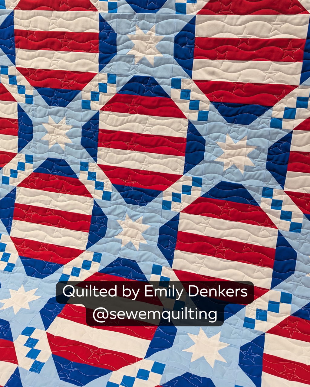 Finished patriotic quilt featuring the Long May It Wave extended width digital pantograph with flowing waves, stars and flag-inspired quilting details