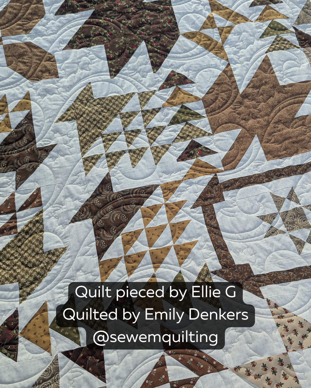 Finished autumn-inspired quilt featuring the Maple Breeze digital quilting pantograph with flowing leaf motifs and curved stitching