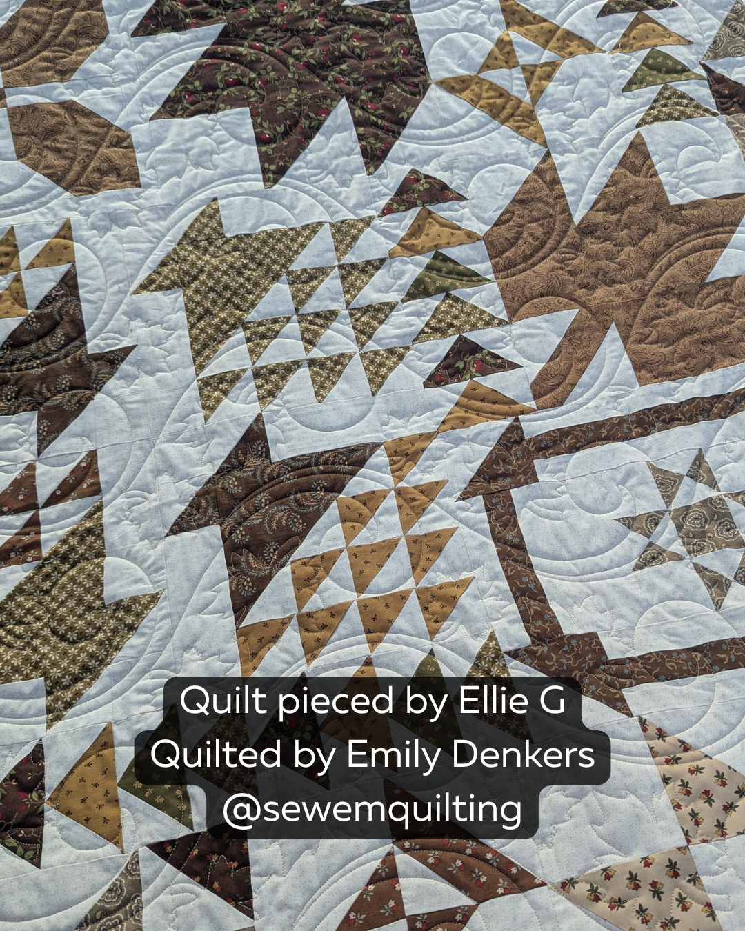 Finished autumn-inspired quilt featuring the Maple Breeze digital quilting pantograph with flowing leaf motifs and curved stitching