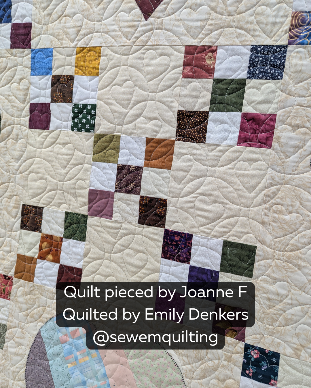 Matchless Heart Peels romantic digital pantograph stitched on a handmade quilt, featuring elegant heart motifs and flowing continuous loop quilting texture.
