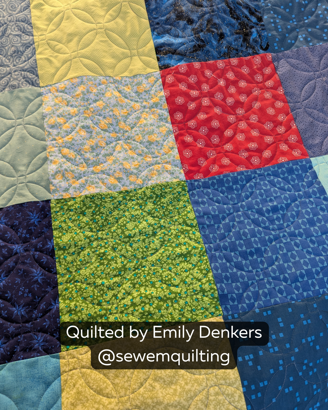 Close-up of a completed rainbow quilt showcasing the Matchless Orange Peel Short longarm quilting design on vibrant multicolor fabric blocks