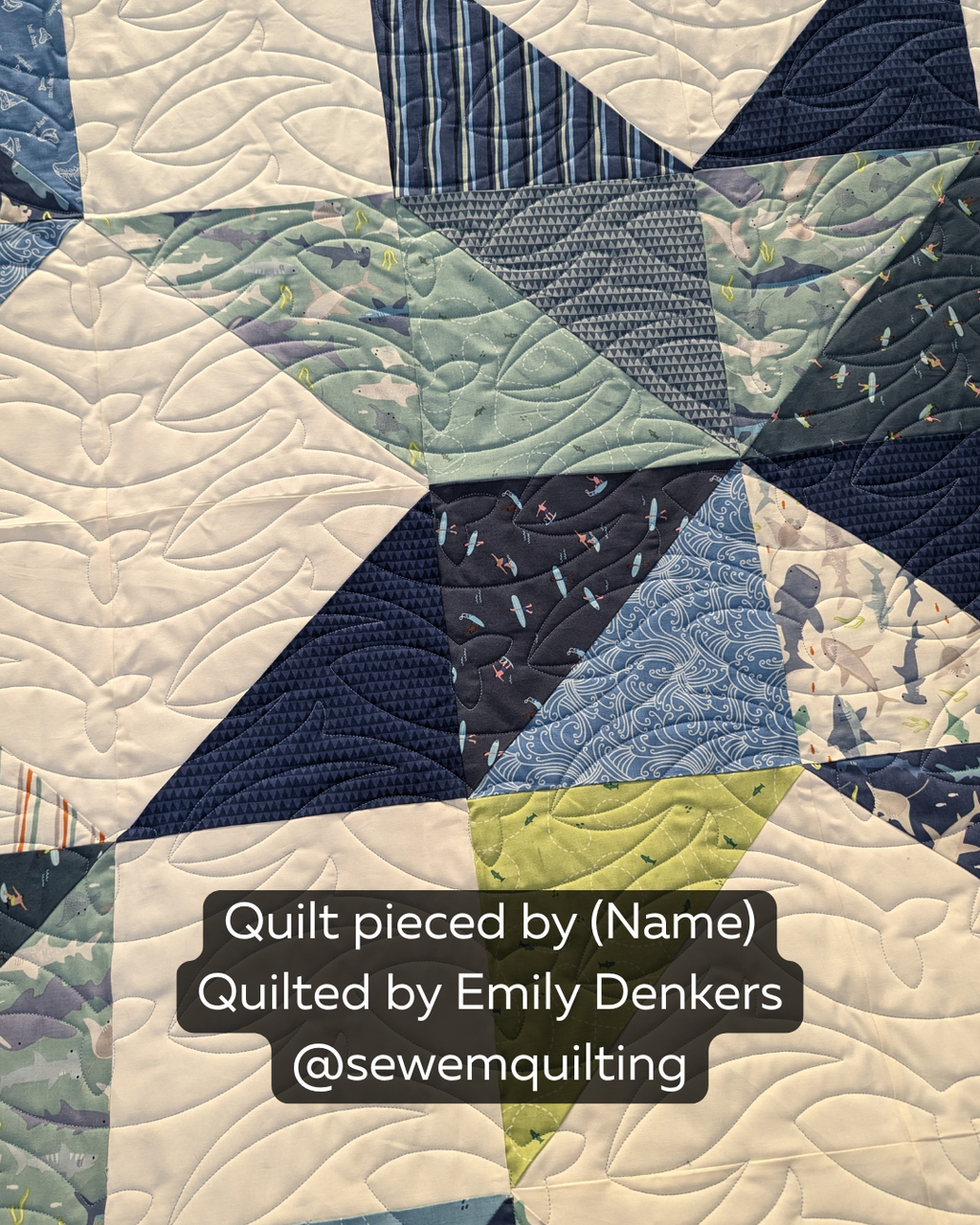 Pod at Sea whale quilting pantograph displayed on a modern nautical quilt with smooth curves, sea-inspired details and edge-to-edge texture