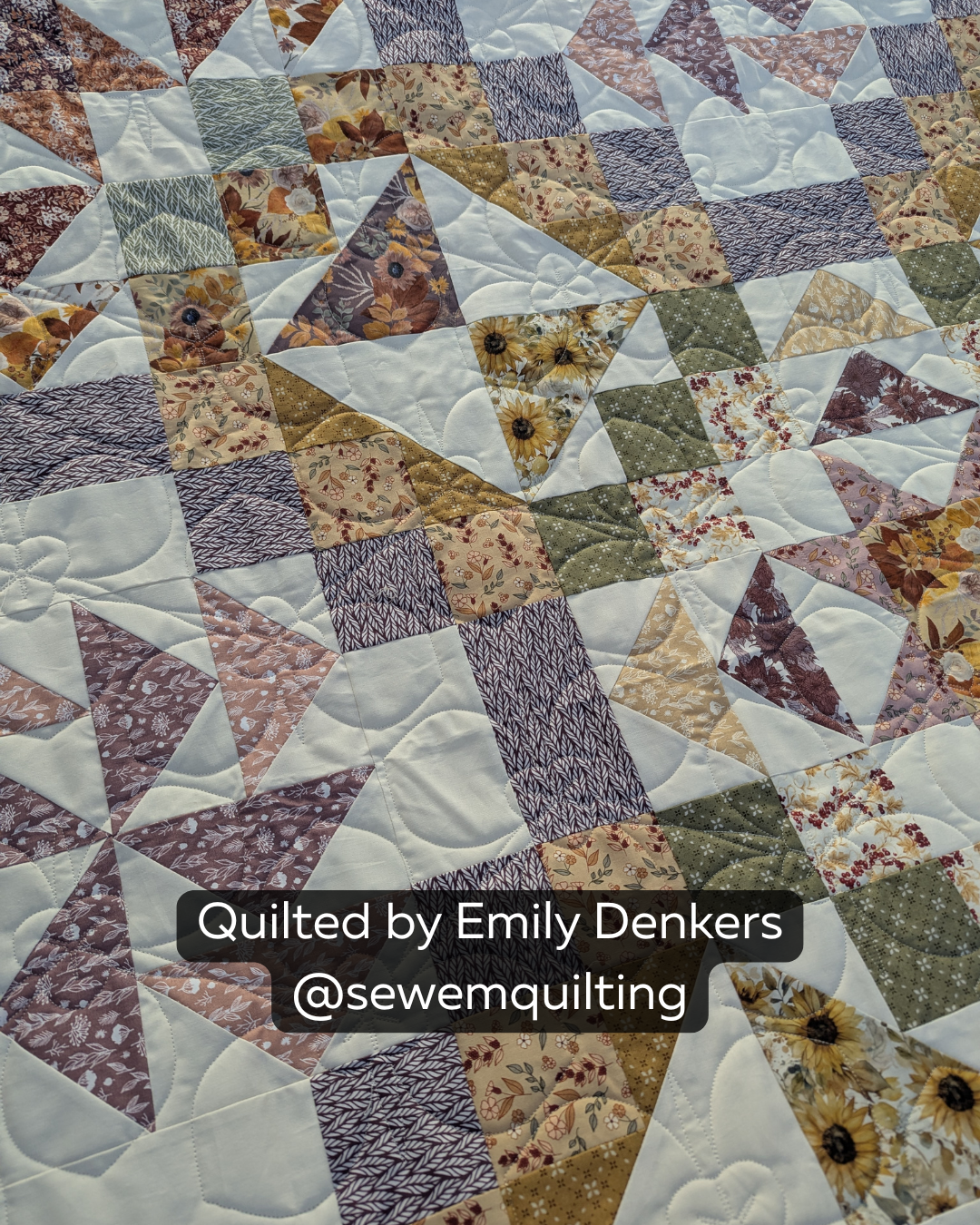 Finished floral patchwork quilt featuring the Sego Lily digital quilting pantograph with delicate flower motifs and flowing edge-to-edge stitching