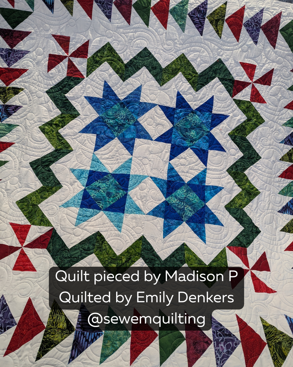 Colorful star quilt stitched with the Sparkling Dreams star swirl digital pantograph