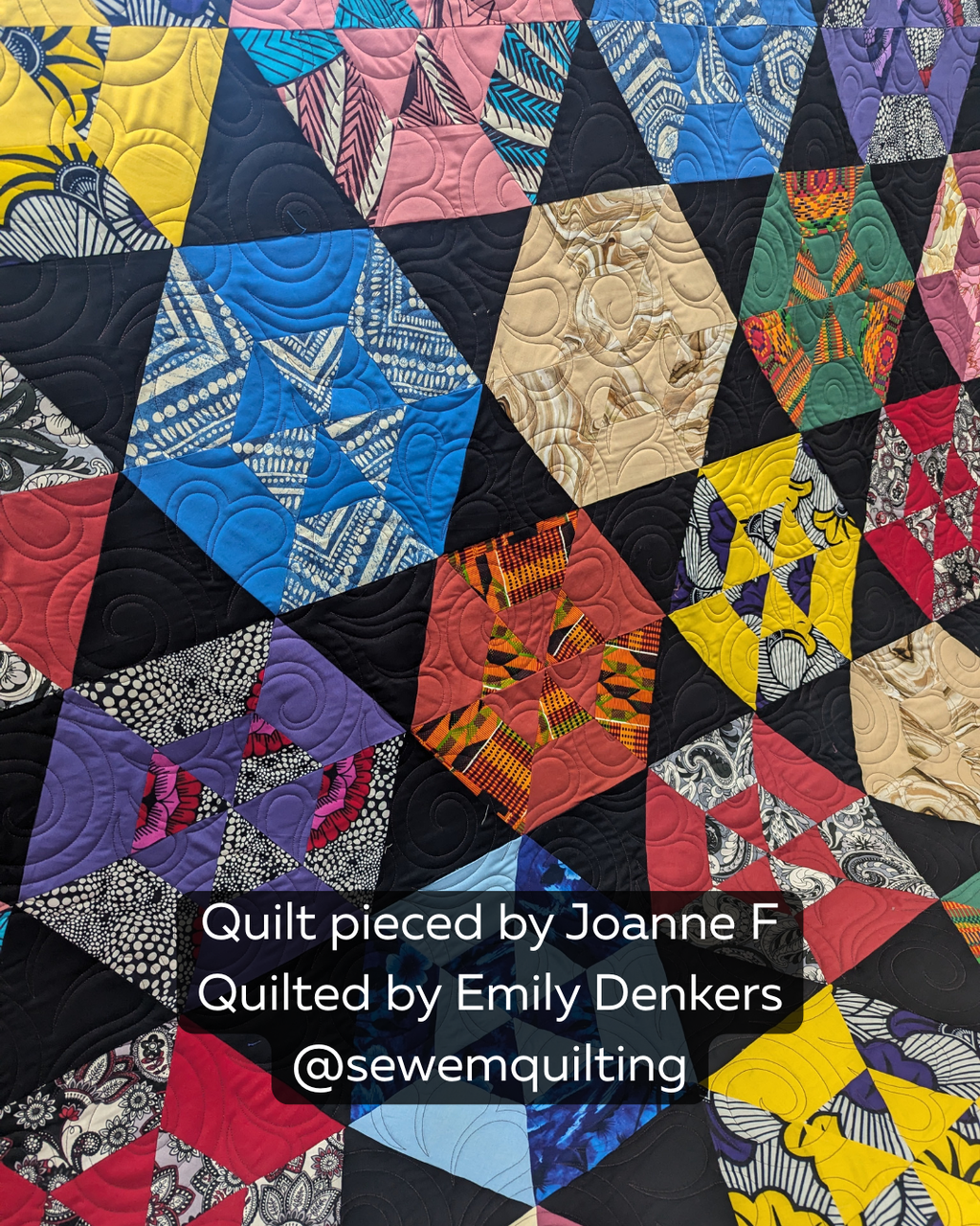 Colorful geometric quilt stitched with the Sploosh playful swirl pantograph