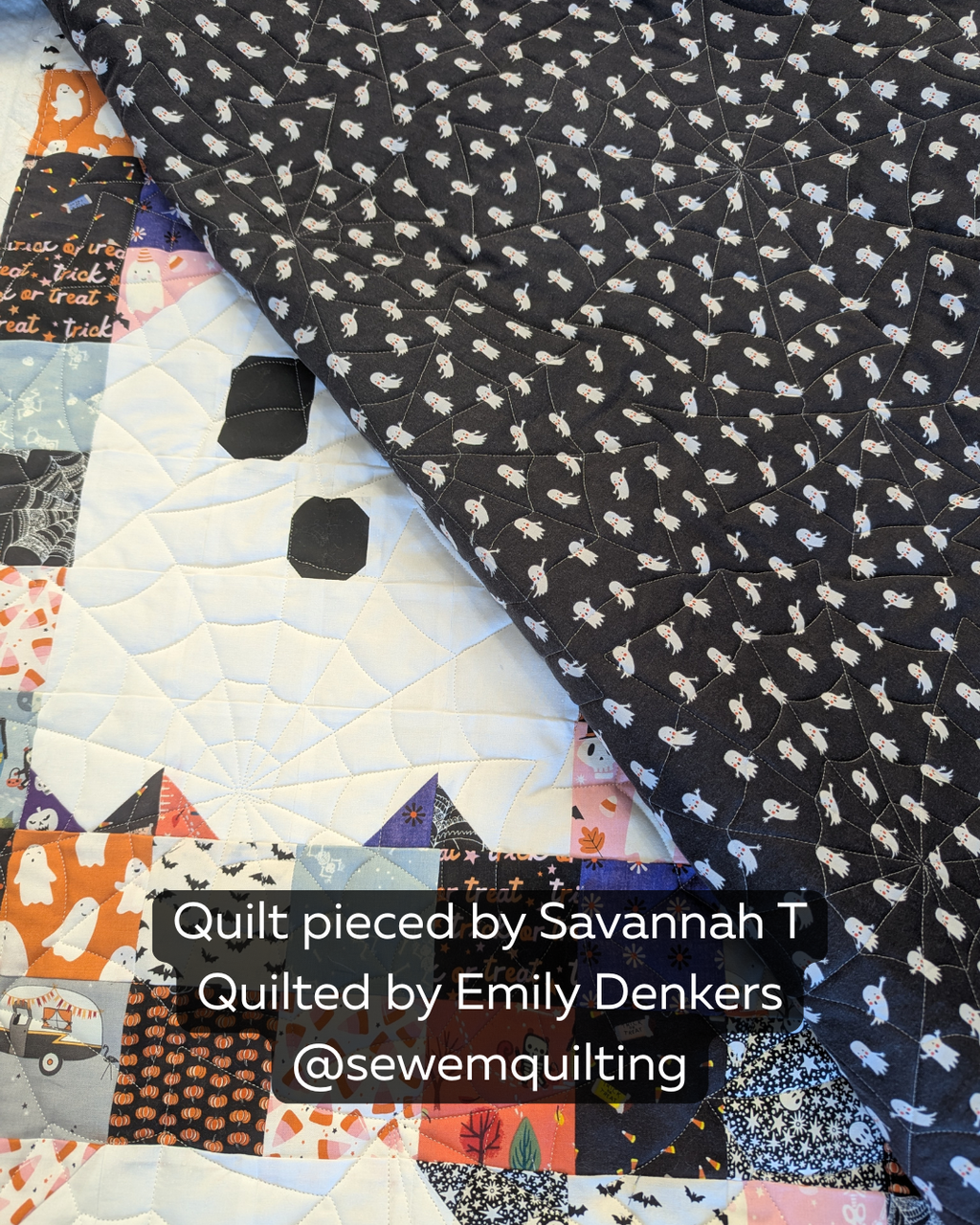 Spooderweb digital pantograph featuring overlapping spiderwebs on a black ghost-print quilt