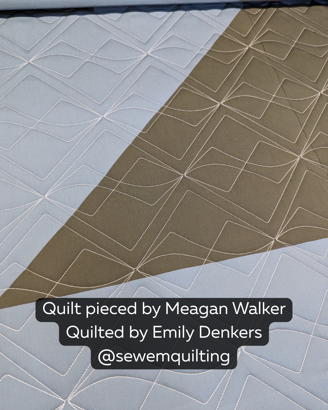 Light blue and taupe modern quilt stitched with the Square Bevel longarm quilting pattern