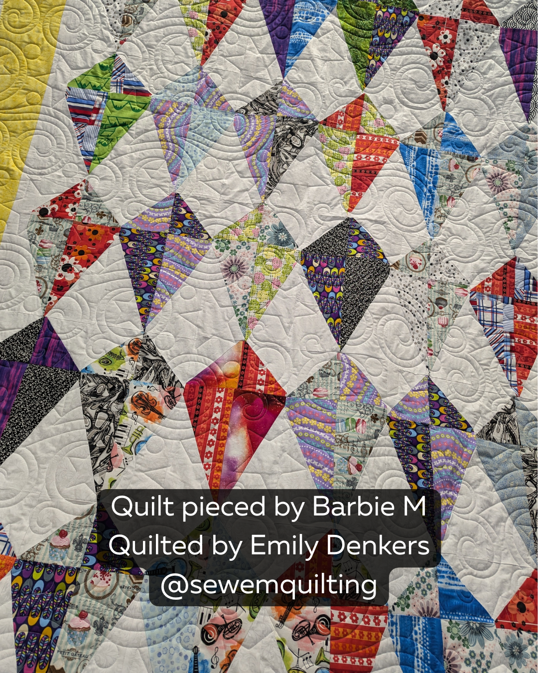 Colorful diamond quilt stitched with the Starry Dreams whimsical star pantograph