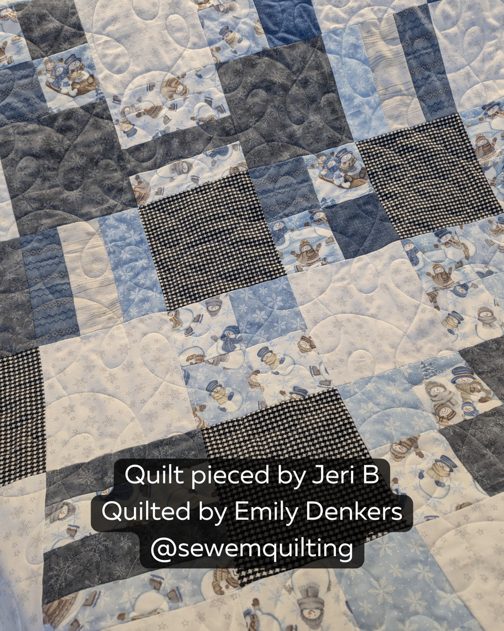 Cozy blue and white snowman quilt showcasing the String quilting pantograph design, adding elegant movement across the seasonal fabric blocks