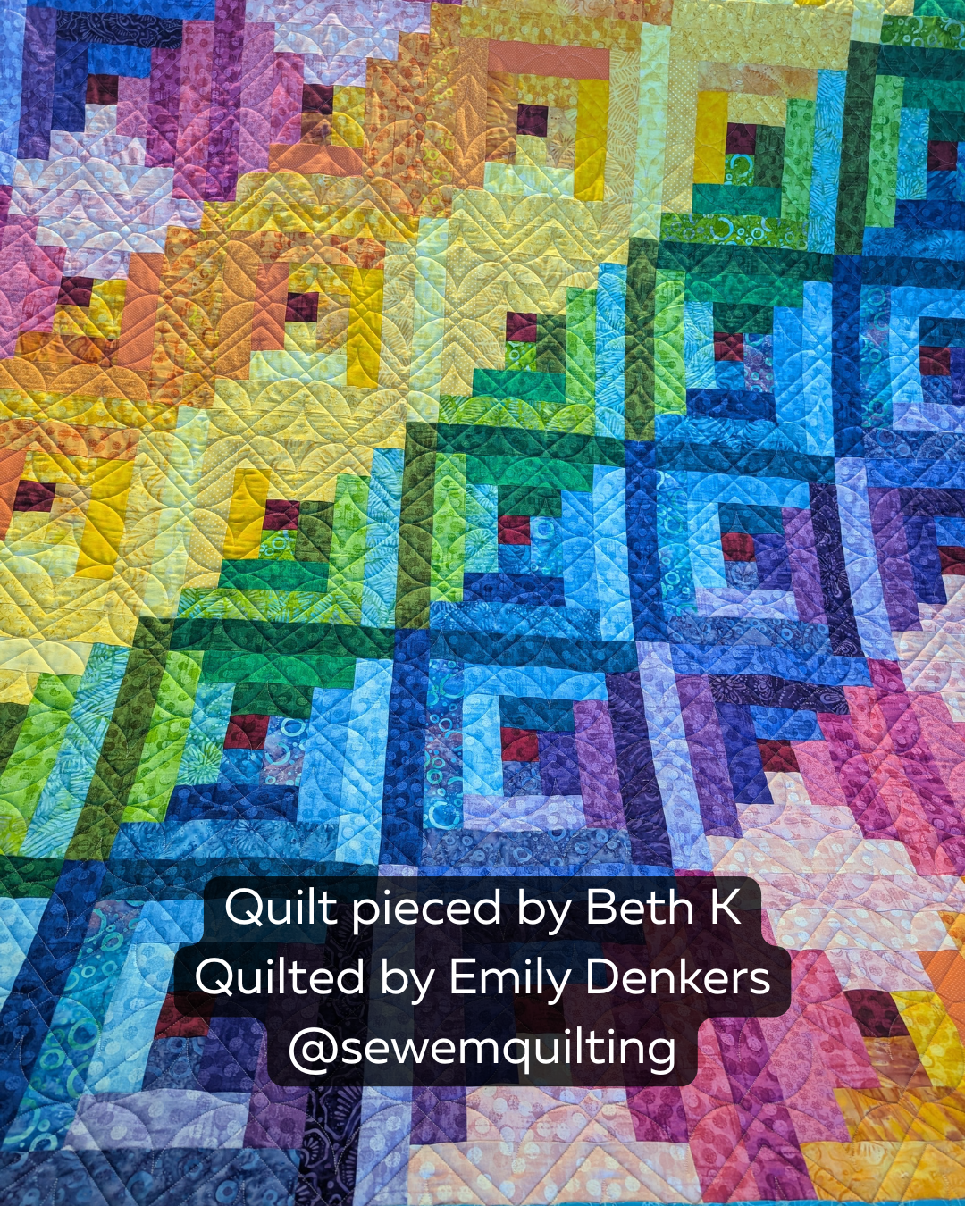 Colorful modern quilt with a spectrum of blues, greens, pinks, and yellows, showcasing the geometric texture of the Twinkle Squares Star digital pantograph