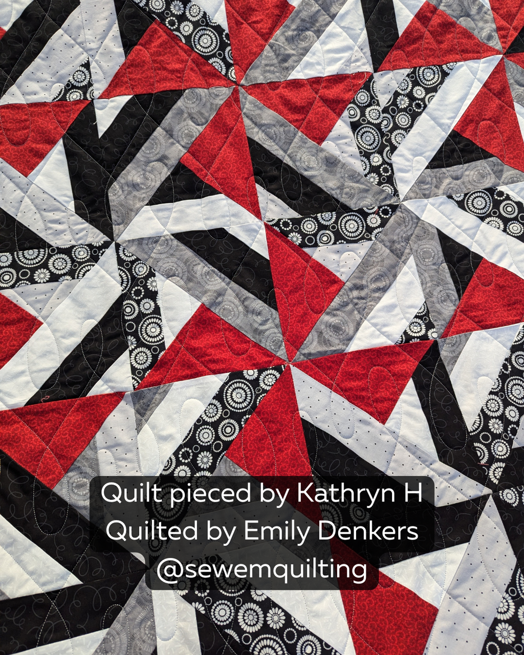 Eye-catching abstract quilt featuring intricate piecing and a stylish flowing quilting texture created with the Uneven Wishbone Loop pantograph