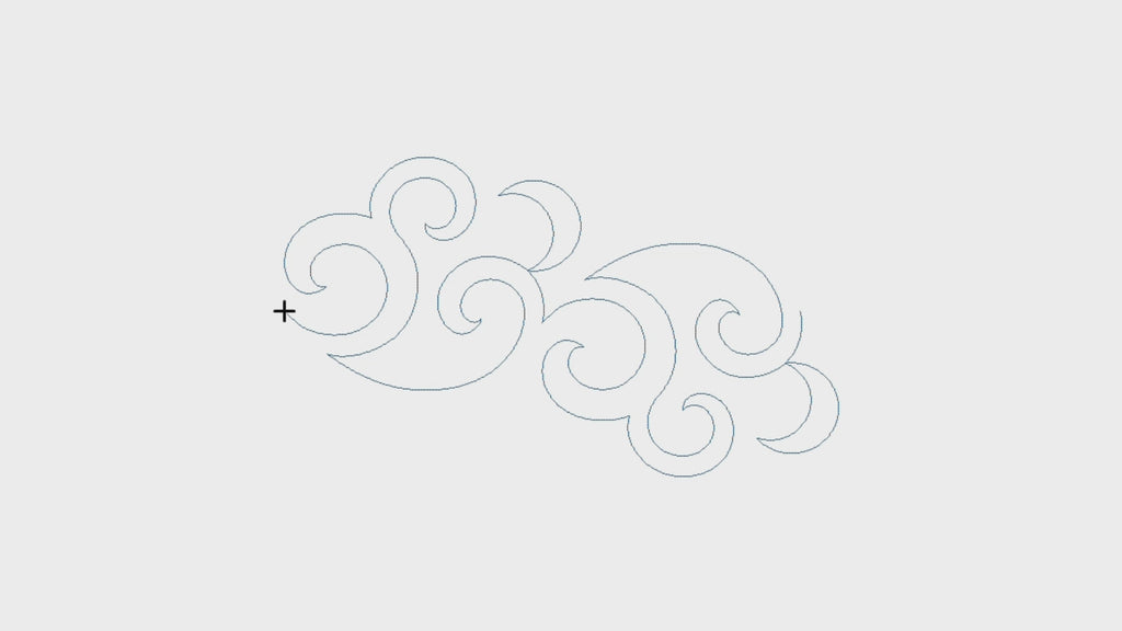 Video demo of the Twirling Moon digital swirl pantograph stitching across a quilt